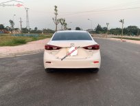Cần bán lại xe Mazda 3 sản xuất 2016, màu trắng xe còn mới lắm Cần bán lại xe Mazda 3 sản xuất 2016, màu trắng xe còn mới lắm