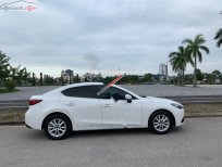 Bán xe cũ Mazda 3 1.5 AT đời 2015, màu trắng Bán xe cũ Mazda 3 1.5 AT đời 2015, màu trắng