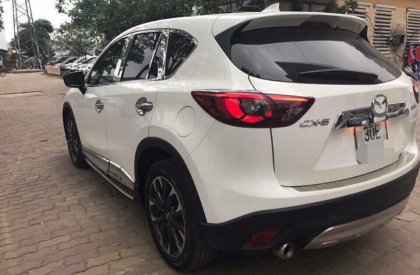 Cần bán gấp Mazda CX 5 2.0AT sản xuất 2016, màu trắng, như mới