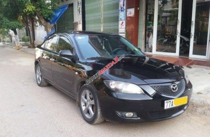 Gia đình bán Mazda 3 đời 2005, màu đen, xe nhập